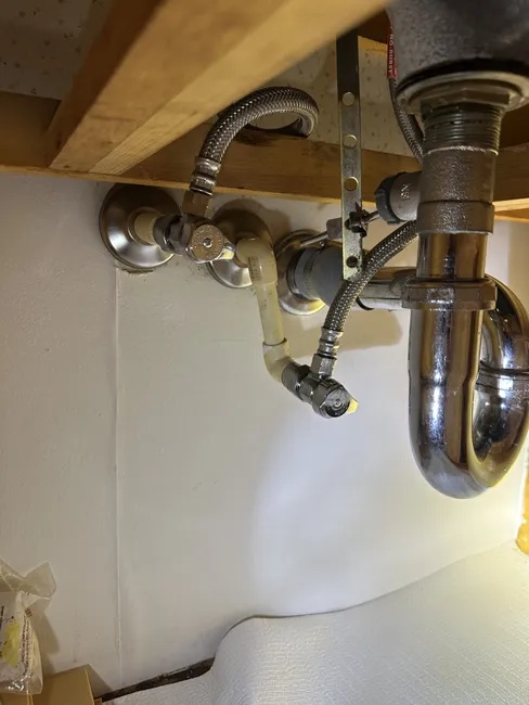 Leaking angle valves in the vanity led us to replace them with durable 1/4 turn valves, enhancing reliability throughout the plumbing system.