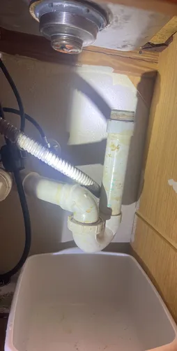 photo at Houston, TX on Dec 03, 2025: A leak was identified from one of the two basket strainers under the kitchen sink, prompting the ne