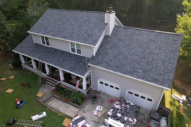 We got John a full roof replacement paid for by Nationwide insurance. Singles - Owens Corning Duration (Estate Gray)