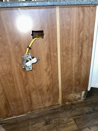 photo at Wichita, KS on Sep 02, 2026: A leak from the dishwasher in the kitchen island led to the discovery of mold on the subflooring. W photo at Wichita, KS on Sep 02, 2026: A leak from the dishwasher in the kitchen island led to the discovery of mold on the subflooring. W