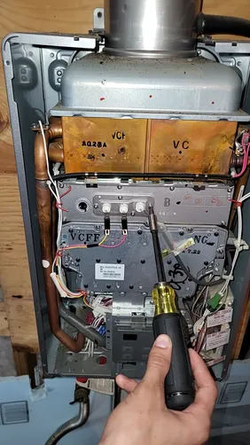 photo at undefined, TX on Sep 30, 2025: The Rinnai tankless water heater was experiencing issues with its ignitor rod, causing inconsistent