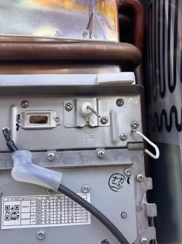 photo at Houston, TX on Nov 12, 2025: A broken igniter coil was diagnosed as the issue with the water heater located outside. We identifi