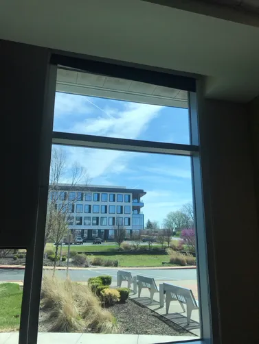 photo at Creve Coeur, MO on Mar 28, 2025: A malfunctioning electric room darkening roller shade needed attention in a commercial space. We re