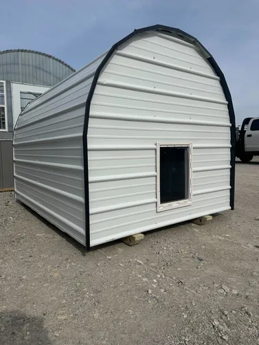 photo at Elm Grove, LA on Jan 12, 2026: CUSTOM 6X8 FULLY ENCLOSED, SOLID FLOOR DOG HOUSE WITH: heat, ac, insulation, light, doggy door-wel