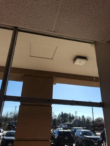 photo at Hazelwood, MO on May 29, 2025: We installed three 3% sheer weave clutch roller shades in black at the property in Hazelwood. The s