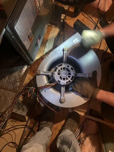 photo at Willis, TX on Dec 11, 2025: A loud rattle noise was identified coming from the air handler unit, indicating a malfunction. Afte