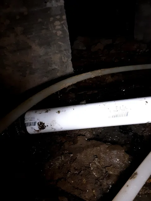 A compromised section of cast-iron pipe was replaced, restoring efficient drainage for this home.