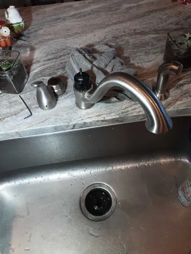 photo at Humble, TX on Nov 10, 2025: A leaking kitchen faucet was identified, prompting us to assess the connections and gaskets. We car