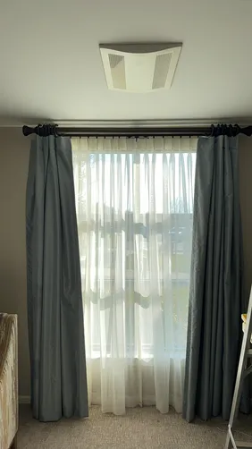 photo at Sunset Hills, MO on Dec 23, 2025: Dual drapery rods repaired with insulation of sheers and room darkening pinch pleat draperies