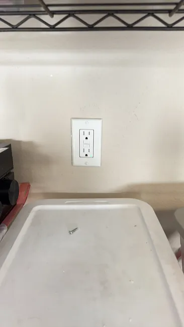 Restoring power to a garage, we replaced a damaged GFCI and repaired an additional circuit for safety.
