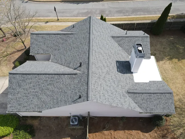 We replaced this roof in Woodstock. Several roofs bought and replaced by the Insurance companies due to hail damage.