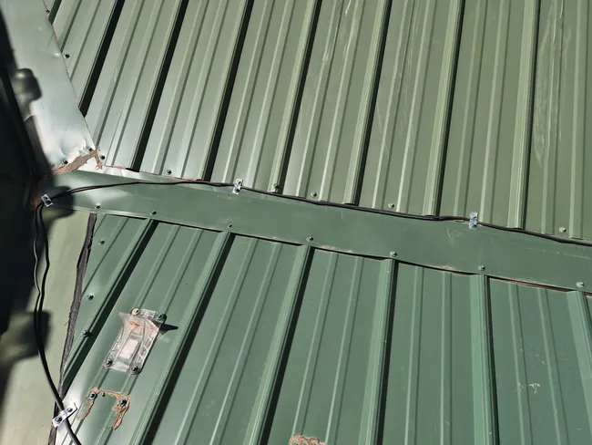 Severe winter conditions forced us to reattach and secure a heat cable, ensuring lasting protection against ice damage.