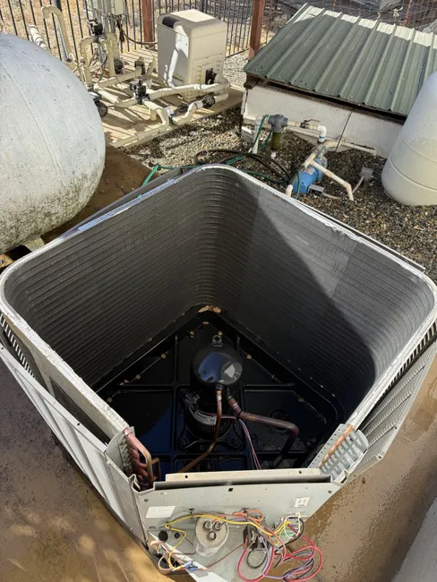 An air conditioning tune-up was performed, optimizing efficiency and ensuring comfort for this residential home.