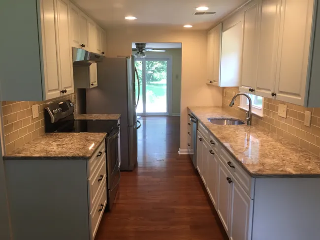 Kitchen, Owners And Guest Bathrooms And Garage