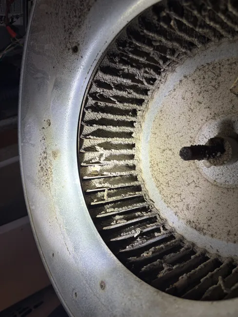 A faulty capacitor was replaced, restoring the HVAC system’s efficiency while guiding the homeowner on blower wheel maintenance.