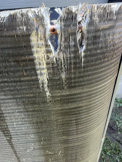 After a DIY mishap, we replaced a damaged condenser coil to restore this home's AC efficiency.