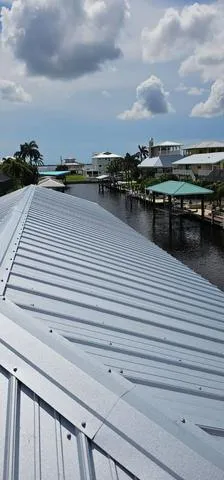 Recently, we installed 26-gauge rib panel metal roofing on a new boathouse, ensuring lasting protection and enhanced curb appeal.