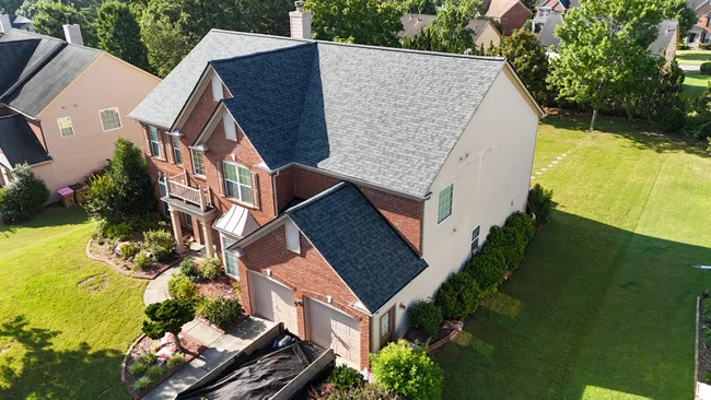 Aashu's home received a stylish upgrade with a full roof replacement using Owens Corning Duration shingles in Estate Gray, all covered by Orion 180 insurance.