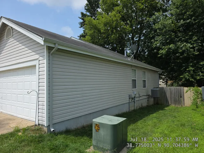 This residential project involved replacing rotten fascia and installing new silver grey gutters, enhancing both drainage and curb appeal.