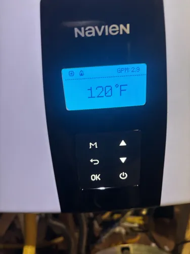 photo at Spring, TX on Sep 19, 2025: A leaking heat exchanger prompted us to inspect the existing tankless water heater, which was still