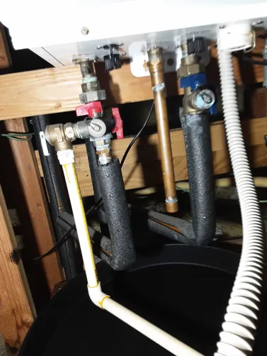 photo at undefined, TX on Nov 20, 2025: A water leak from the tankless water heater's pipe connections required immediate attention. We rep