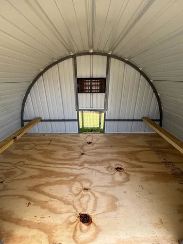 photo at Coleman, OK on Dec 30, 2025: 2 - 8x10 chicken coops in Lightstone and rustic red-welded steel frame, roll away nesting box, roo