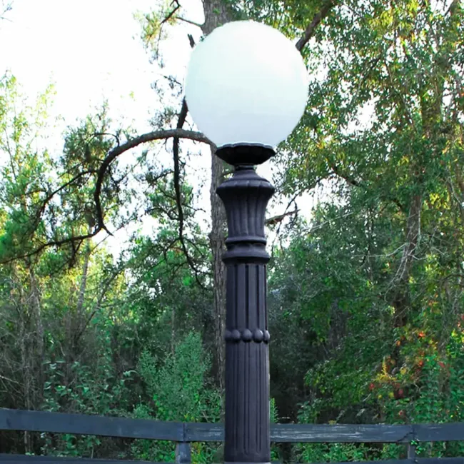 A non-functioning post light was restored with a new socket and repaired junction for consistent illumination.