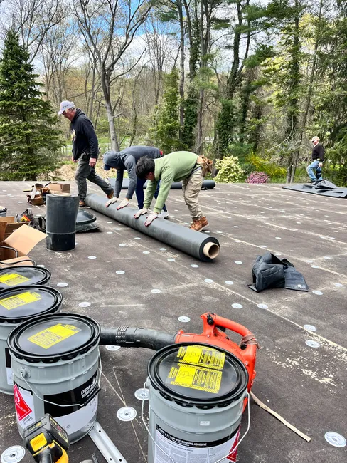 I installed a EPDM rubber membrane roof with two new skylights curb mount