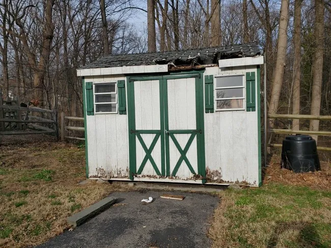 In Springfield, we carefully dismantled a damaged shed, clearing the space for the homeowner’s future plans.