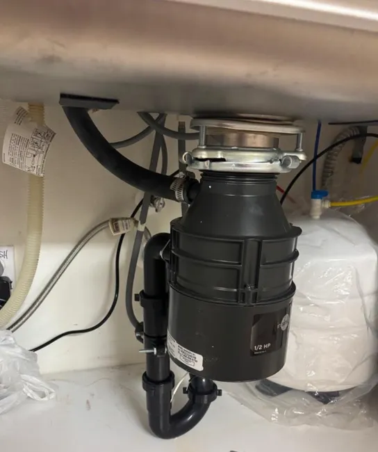 Restored kitchen efficiency by replacing a malfunctioning garbage disposal. Ready for hassle-free waste management!