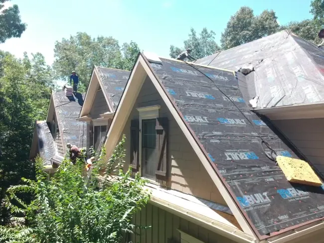 This large roof completed quickly on this beautiful day!