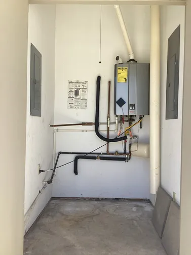 photo at Boerne, TX on Mar 24, 2026: A slow leak on the nipples of a Rinnai tankless water heater indicated a need for urgent attention. photo at Boerne, TX on Mar 24, 2026: A slow leak on the nipples of a Rinnai tankless water heater indicated a need for urgent attention.