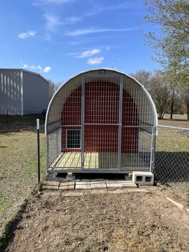 photo at Grand Saline, TX on Dec 18, 2025: 8x10 dog kennel in rustic red