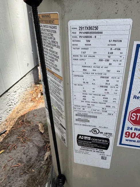 Restored comfort in a residential home by repairing a short circuit in the thermostat wire and replacing the fuse.