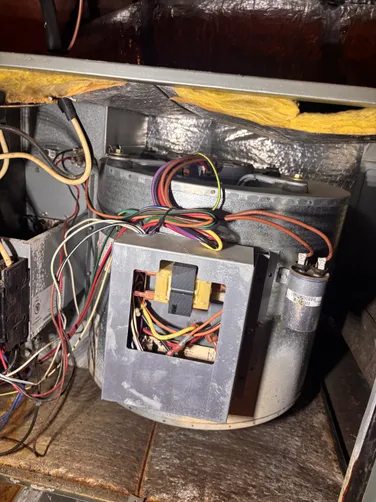 photo at Willis, TX on Dec 11, 2025: A loud rattle noise was identified coming from the air handler unit, indicating a malfunction. Afte