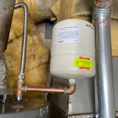 photo at Martinez, CA on Nov 27, 2025: A leaking water heater can lead to significant issues, so we replaced the old unit with a new Rheem