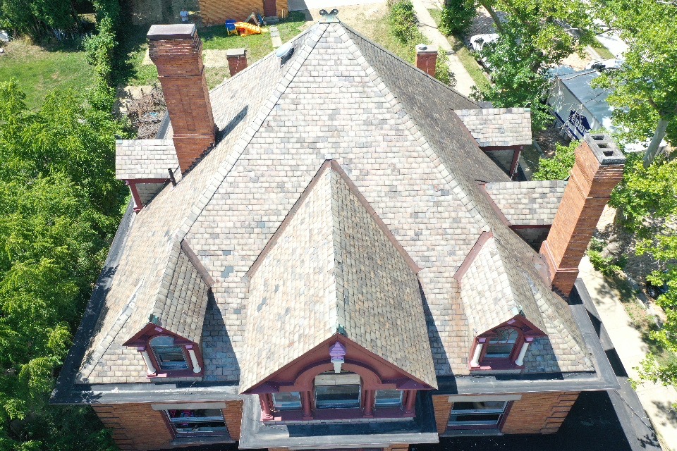 The Washington slate-to-shingle job. Slate tear-off is heavy, dusty work