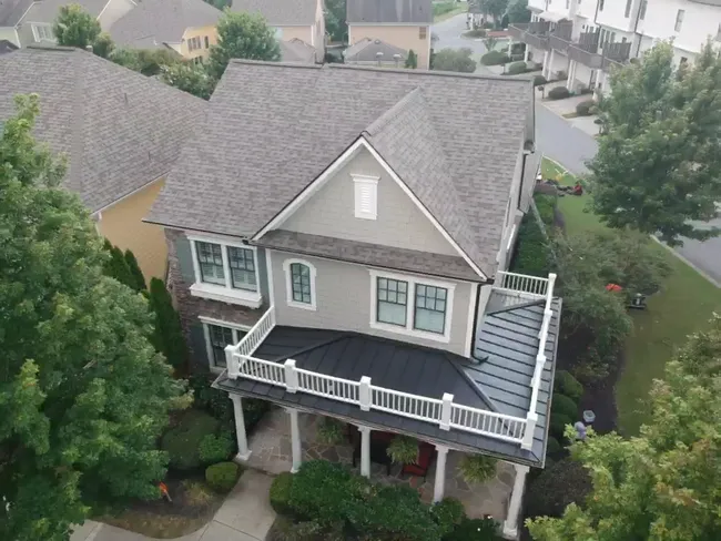 Look at this impressive new roof accentuating such an adorable house! 