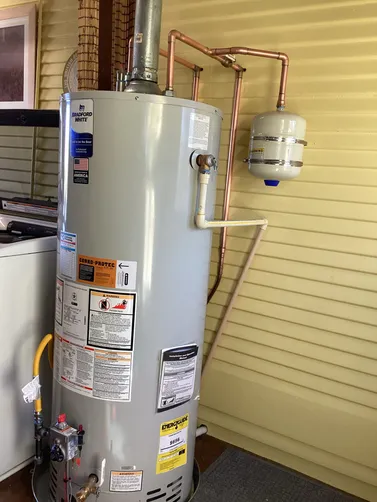 photo at Fredericskburg, TX on Mar 20, 2026: An aging water heater was leaking from the base, prompting the need for immediate replacement. We i photo at Fredericskburg, TX on Mar 20, 2026: An aging water heater was leaking from the base, prompting the need for immediate replacement. We i