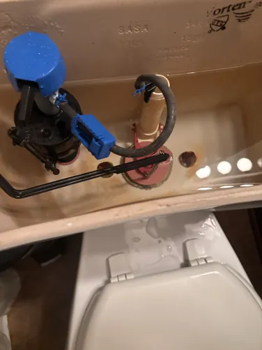 photo at Spring, TX on Dec 02, 2025: A leak was observed between the toilet tank and bowl during flushing. We replaced the rusted bolts 