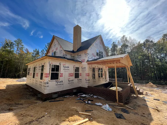 Checking the job site where the guys are installing Pinnacle Pristine architectural asphalt shingles.