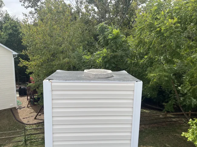 We installed asphalt shingles for this customer back in July and they invited us back to do some additional work. We just finished installing a new chimney chase cover.