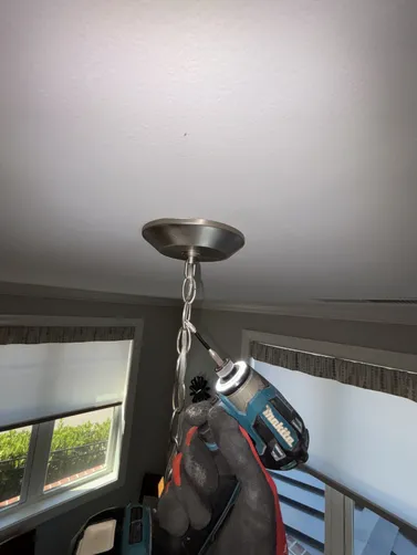 We repaired a round fixture box that was holding a small chandelier. troubleshot a receptacle with no power.