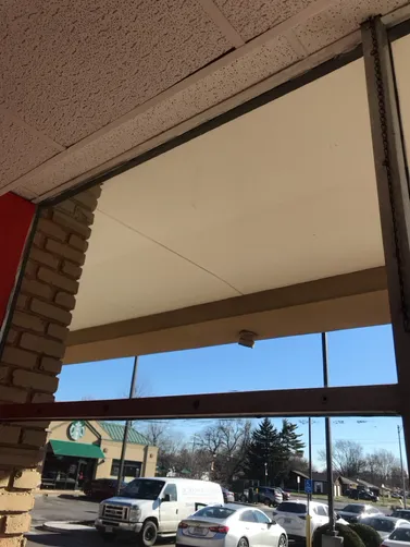 photo at Hazelwood, MO on May 29, 2025: We installed three 3% sheer weave clutch roller shades in black at the property in Hazelwood. The s