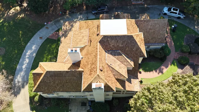 A full cedar roof replacement revitalized this home with enhanced durability and lasting value for the homeowner.