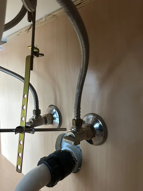 Old, corroded gate-style stops were replaced with reliable quarter-turn Dahl valves, enhancing efficiency.