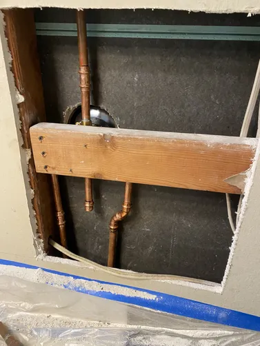 photo at Martinez, CA on Mar 28, 2026: A leak was discovered in the wall due to a damaged copper line connected to the shower. We addresse