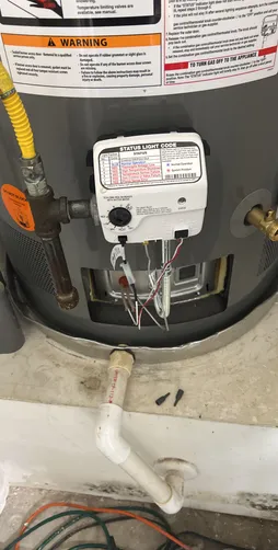 photo at undefined, TX on Nov 20, 2025: A water heater malfunction, indicated by a blinking seven times, was identified, suggesting an issu