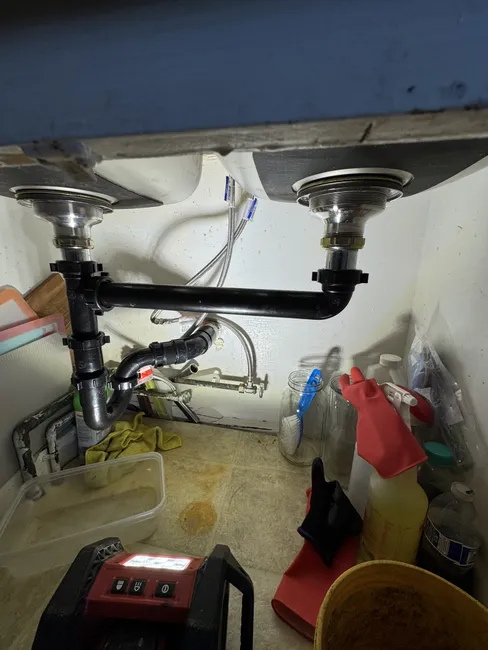 At a residential property, we installed PVC waste lines for a double-bowl sink, ensuring optimal drainage and durability.