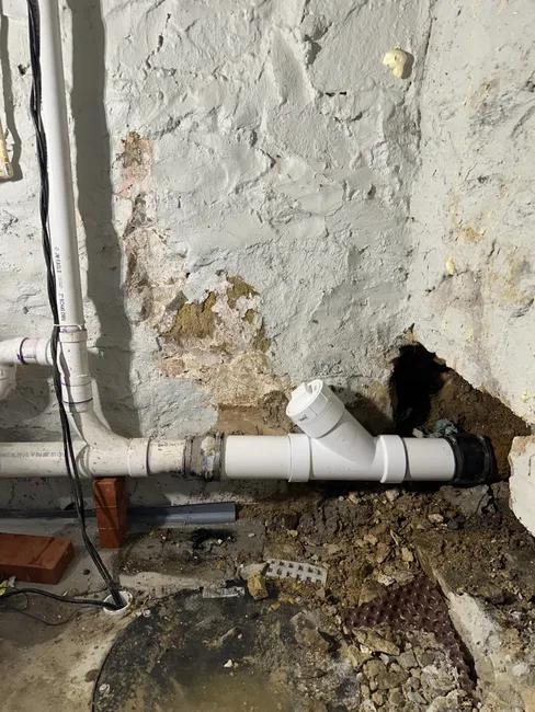 Our team skillfully replaced a damaged cast iron pipe, ensuring seamless connection to PVC for optimal drainage.